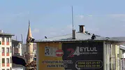 Sivas'ta ölüme meydan okuyan tamirat: Beş katlı binanın tepesinde korku dolu anlar