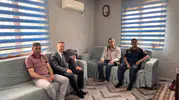 Karacasu protokolünden şehit aileleri ve gazilere bayram ziyareti