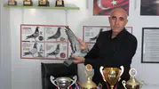 Bin kilometreyi bir günde uçan şampiyon güvercin evine döndü