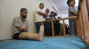 Kollarını ve bacağını kaybeden Muhammed hayata inançla tutunuyor