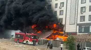 Karaköprü’de apartman dairesini saran depo yangını paniği