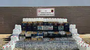 Alanya'da sahte içki baskını Depodan bin litre alkol çıktı
