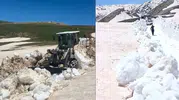 Hakkari’de yaz ortasında yolları kapatan üç metrelik kar kütleleri