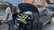 Erzurum'da otomobilin motoruna gizlenen yavrular itfaiye ile kurtarıldı