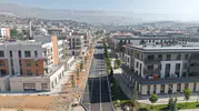Kahramanmaraş’ta deprem sonrası kurulan mahalleye 18 milyonluk asfalt yatırımı