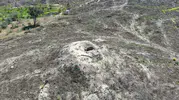 Çanakkale’deki yangın tarihi bir mezarı gün yüzüne çıkardı