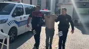 Kütahya sokaklarında yakalanan şüphelinin altından kırmızı bülten çıktı
