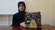 13 yıllık kalem birikimi minyatür bir eve dönüştü