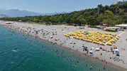 Antalya kavurucu sıcakla tanıştı sahil doldu taştı