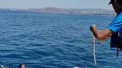 Kuşadası açıklarında akıntıya kapılan kadın son anda kurtarıldı