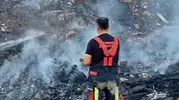 Balıkesir'de otluk alandaki yangın evlere ulaşmadan söndürüldü