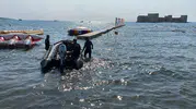 Denize girip kaybolduğu sanılan adam sahilde yürürken bulundu