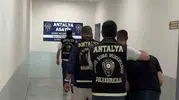 Antalya'da kuyumcuları sahte altın dişle dolandıran çete yakalandı