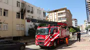 Manavgat'ta bir dairede çıkan yangın mahalleliyi sokağa döktü