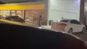 Bursa'daki benzinlikte sopalı kavga anbean görüntülendi