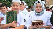 Çorumda çocuklar şehitler için bir dakikada hatim indirdi