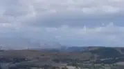 Arnavutköyde otluk alandan hobi bahçelerine sıçrayan yangın paniği