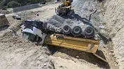 Arnavutköy'de toprak kayınca hafriyat kamyonu devrildi