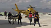 Traktör devrilen genç için havalanan ambulans helikopter