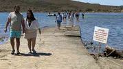 Ayvalık’ta yürüyerek karşıya geçilen boğazda ölüm tehlikesi büyüyor