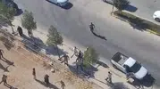 Ergani'de husumetli aileler jandarma önünde birbirine girdi
