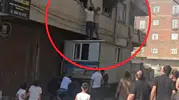 Bismil'de alevlerin arasında kalan kadına konteynerli kurtarma operasyonu