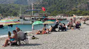 Takvimler sonbaharı işaret etse de Fethiye'de yazın ateşi sönmüyor