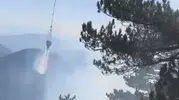 Fethiye'nin sarp yamaçlarında alevlerle zorlu mücadele