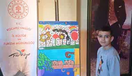 Otizmli sporcunun fırçasından dökülen sanat eserleri sergilendi