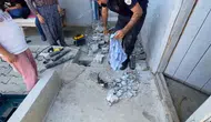Malatya’da boruya sıkışan kediye itfaiye yardımı