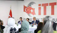 Bakan Işıkhan gurbetçilerin İsviçre'deki sorunlarını dinledi