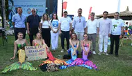 Kemer sahillerinde deniz kızı kostümlü çevre temizliği