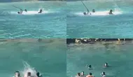 Mersin’de tatilcilerin gözü önünde denizde sopalı kavga