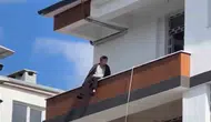 Iğdır’da inşaatın tepesindeki kişi polisi alarma geçirdi