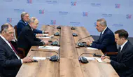 Hakan Fidan Rusya’da Putin ile masaya oturdu