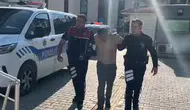 Kütahya sokaklarında yakalanan şüphelinin altından kırmızı bülten çıktı