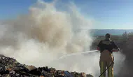 İznik’teki eski çöplükte rüzgarla büyüyen yangın