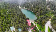 Temmuz ortasında mont giydiren kaçış noktası