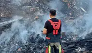 Balıkesir'de otluk alandaki yangın evlere ulaşmadan söndürüldü