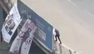 Adana'da köprüye pankart asan kişi polis tarafından gözaltına alındı