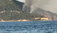 Büyükada plajında akşam saatlerinde korkutan yangın