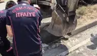 Osmaniye'de mazgala sıkışan kediye itfaiye yardımı