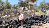 Emekli itfaiyeci alevlerin arasında evini tek başına kurtardı