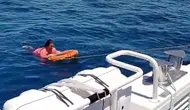 Kuşadası açıklarında sürüklenen kadın deniz polisiyle kıyıya döndü