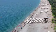 Antalya kavurucu sıcakla tanıştı sahillere hücum etti