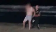 Kumbağ sahilinde fırtınaya karşı alkollü inat