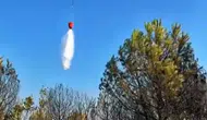 Rüzgarın sıçrattığı yangını ekipler 3 saatte söndürdü