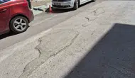 Kurtuluş Mahallesi sürücüleri çukurlu yollardan dertli