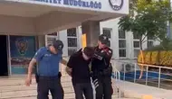 Aliağa'da aranan dolandırıcı polis ekiplerine yakalandı