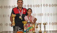 İtfaiyeci baba kortta kızıyla şampiyonluk kovalıyor